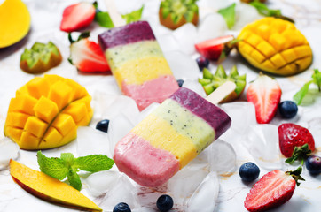 strawberry mango kiwi blueberry ice cream with fruits and ices