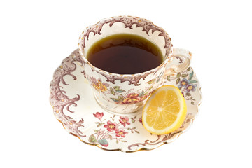Elegant rustic vintage tea cup with lemon