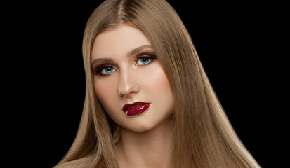Fototapeta premium Face, blue eyes, black background