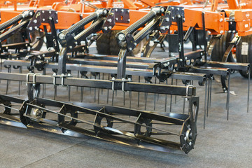 New, modern agricultural machinery. Stubble cultivator close-up.