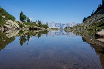Fototapeta premium Dachsteinspiegelung Dachstein Österreich Alpen