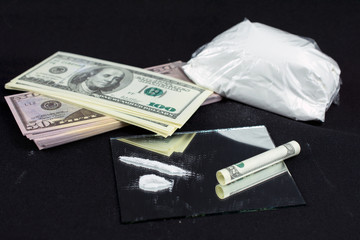  sniffing cocaine lines on mirror close up of drugs with money on the mirror cocaine pack crime...