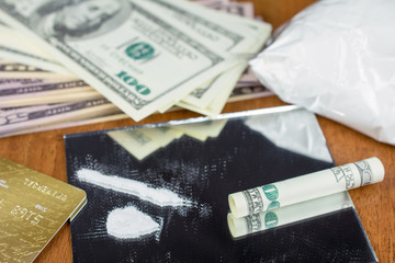  sniffing cocaine lines on mirror close up of drugs with money on the mirror cocaine pack crime...