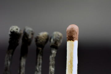 burning matches on a dark background crisis intervention concept, close up,  selective focus ,...