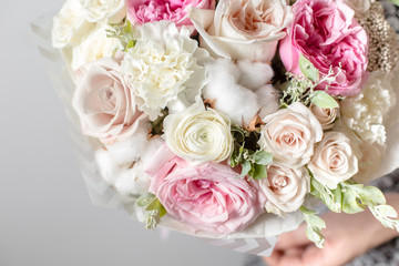 Mix flowers. Luxury bouquets in the girl's hands