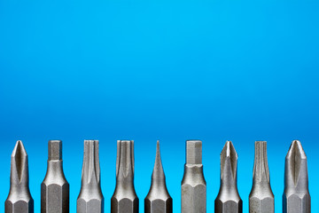 Set of heads for screwdriver (bits) Tools collection copy space, close up, selective focus, blurred...