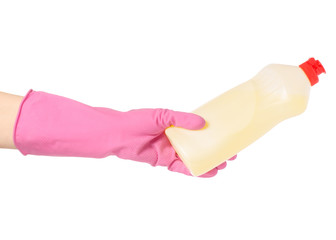 Dishwashing Detergent dispenser bottle lemon yellow in hands in rubber gloves