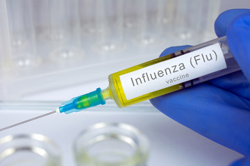 Vaccination healthcare concept. Hands of doctor or nurse in medical gloves with medical syringe...