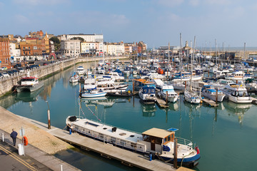 Fototapeta na wymiar The marina of the Royal Harbour of Ramsgate, Kent, UK. The town has one of the largest marinas on the English south coast. It was given its royal status by King George IV