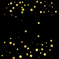 Golden confetti isolated on black background.