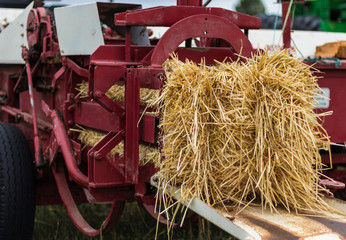 Red Straw Baler