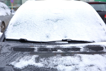 Cars that stand in the open air in the winter are usually exposed to frosty weather conditions and in addition, during snowfall are all white.