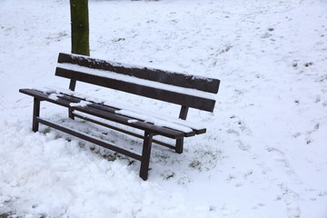 A bench in winter is the object that is least used even in the park.