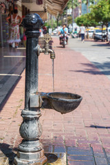 Tap with drinking water on the streets of the city