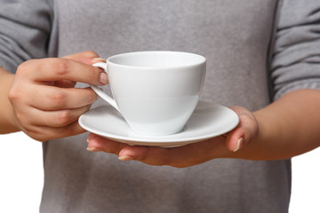 Hands holding a white Cup with a drink