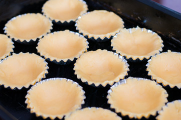 Raw Polish babeczki cake in molds.