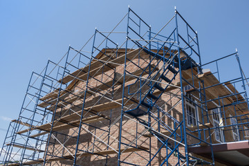 scaffolding on brick building