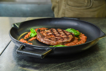 Grilled steak on grill pan