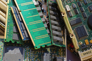 A heap of old computer parts: memory, network cards, graphics cards
