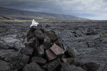 the volcanic wasteland of old lava fields on the big island of hawaii in the pacific ocean showing the landscape of volcano national park