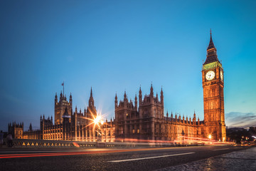 Obraz na płótnie Canvas London famous view. Long exposure shot of Big Ben, Westminster bridge and House of parliament. Evening scene.