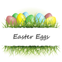 Easter background with eggs in grass and with copyspace