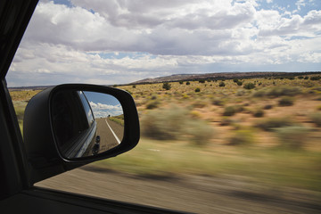 View out the car window as the scenery blurs by