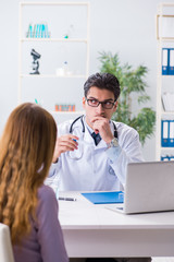 Patient visiting doctor for medical check-up in hospital