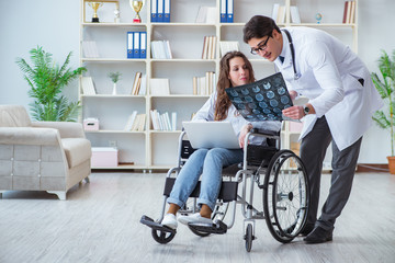 Doctor discussing x-ray image with patient