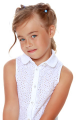 Fashionable little girl in a dress