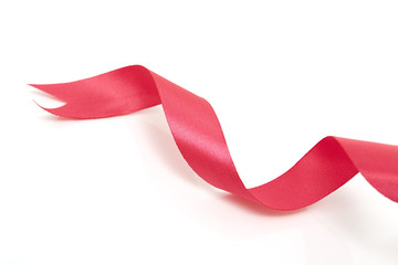 Red curly ribbon on white