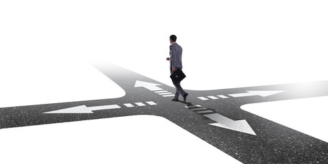 Young businessman at crossroads in uncertainty concept
