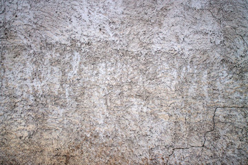 Cement plastered wall. A crack in the wall.