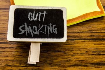 Handwritten text showing Quit Smoking. Business concept for Stop for Cigarette  written on...