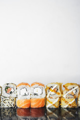 sushi roll on white background with copyspace