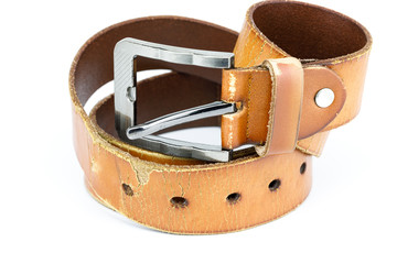 Damaged cow leather belt on white background isolated
