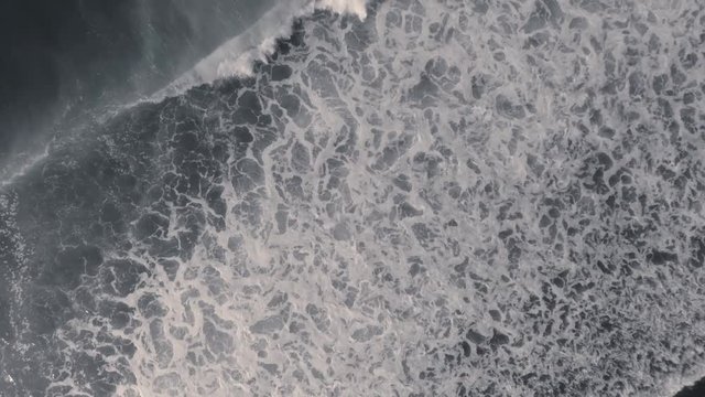 Aerial view of beach and ocean with waves in Bali, Indonesia Asia