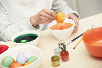 Woman preparing Easter eggs