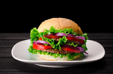 Burger served in bun in nutrition fast food concept