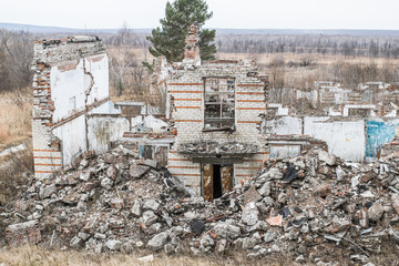 Old destroyed an abandoned multi-storey building in a military town