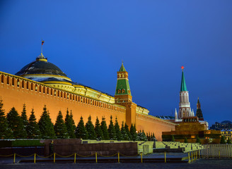 View of the Red square and the Cathedral at night and in the evening in winter