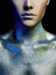 Portrait of Beautiful young Woman in Sparkles