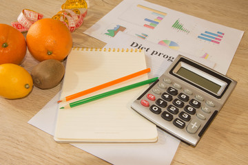 Products with low fat content. Fruits and measuring tape