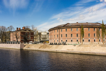 Fototapeta na wymiar Ancient buildings on the river bank.