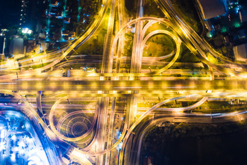 Night traffic aerial view vehicle light movement junction