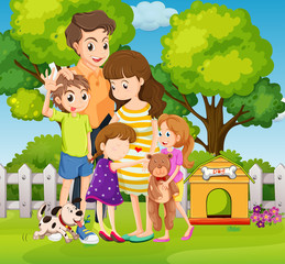 Lovely family with three kids and dog in garden