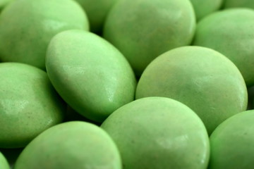 Large green pills close up