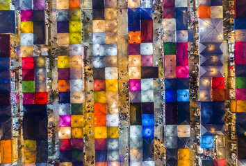 Fototapeta premium Multicolour Rod Fai night Market aerial view located in Ratchada area of Bangkok, Thailand