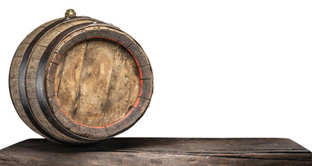 Wine barrel on the old wooden table. File contains clipping path.