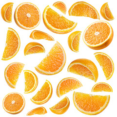 Set of ripe orange fruit and orange slices isolated on white.